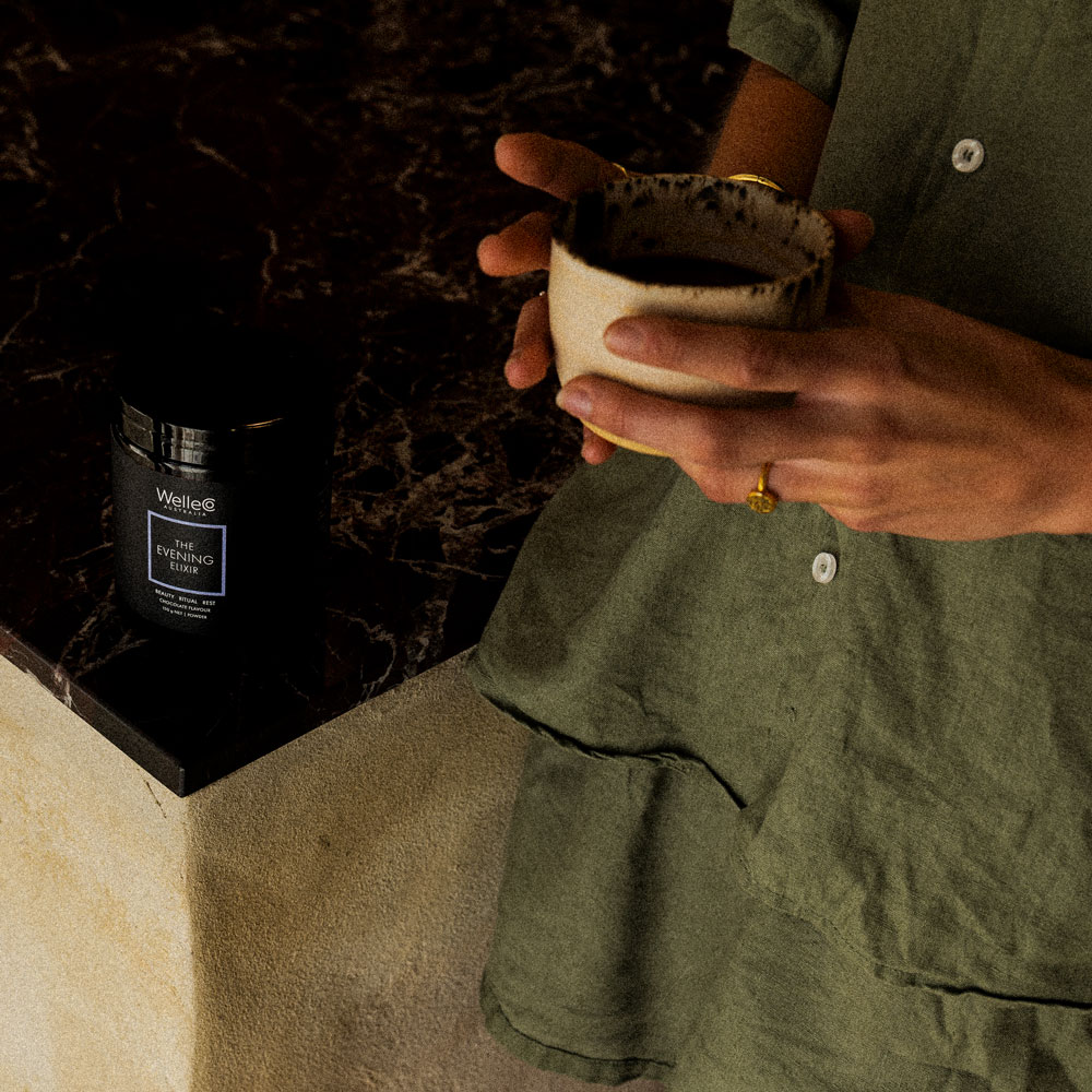 Woman holding Evening Elixir